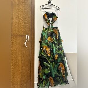 Retrofete evening gown with tiger print. Sexy cut outs. Never worn.